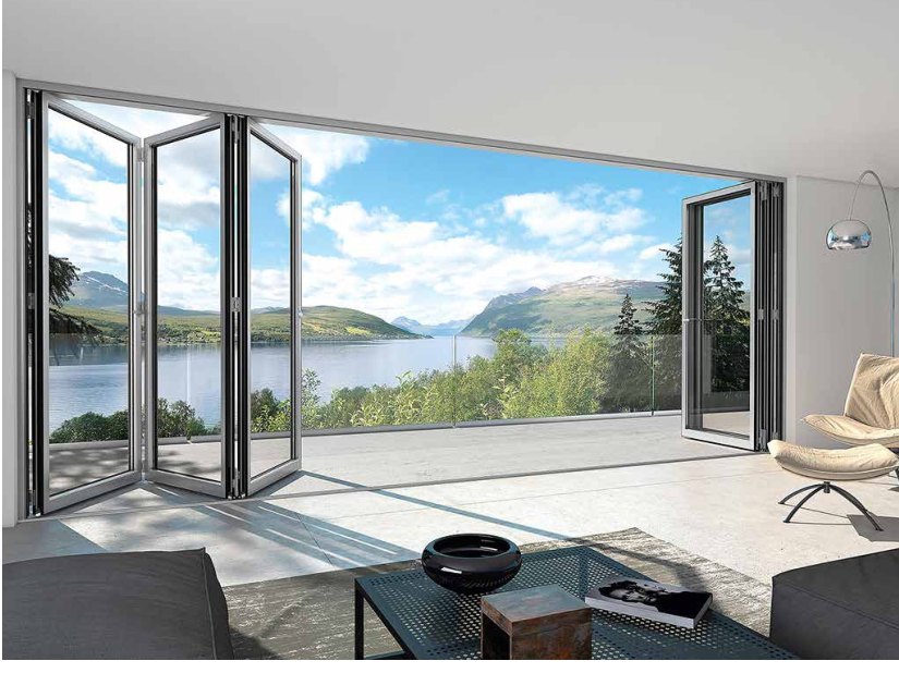Bi-fold glass door fully opened to a lake view